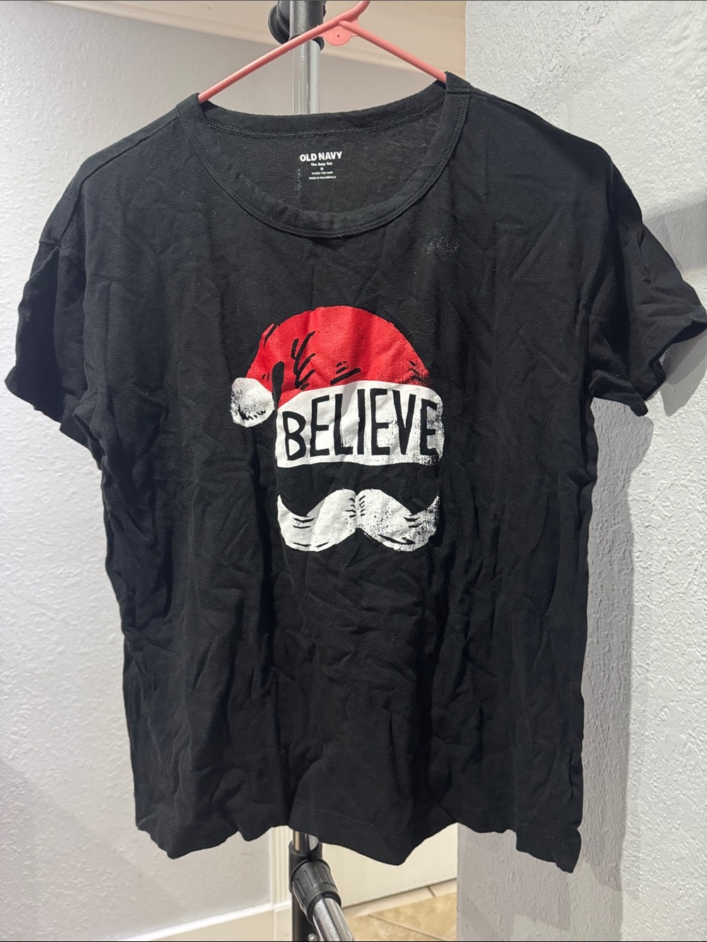 Old Navy Black Graphic 'Believe' Tee with Red Santa Hat